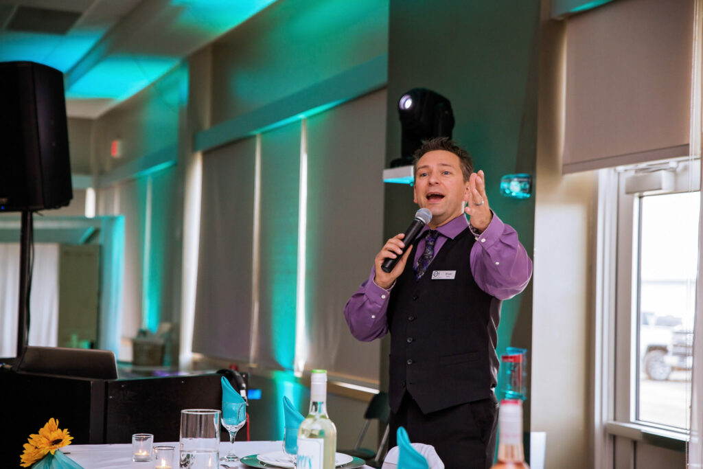 Expressions DJ & MC, Bryan, acts as Mast of Ceremony at a wedding in Virden. Photo by Mark Willis Photography